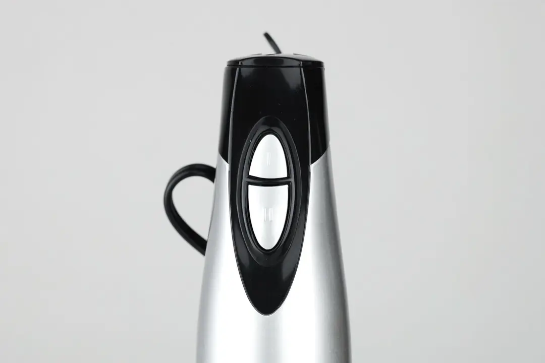 A close-up of two speed controlling buttons on the front interface of the Hamilton Beach hand blender.