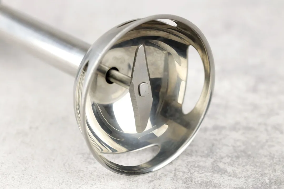 A close-up of the blade assembly sporting 2 sharp prongs of the Hamilton Beach immersion blender.