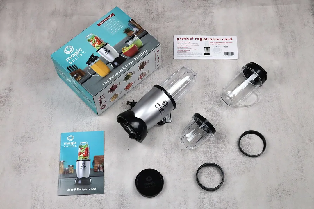 Our Magic Bullet Blender Small Silver 11-Piece Set includes a motor base, a to-go lid, three blending cups, a party mug, two lip rings, two resealable lids, a paper carton box, and a user & recipe book guide.