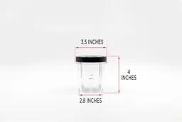 The blending cup of the Magic Bullet personal blender standing on a table with dimension measurements written to the side (3.5x4x2.8 inches).