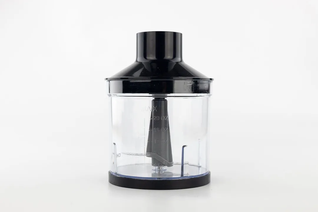 The Chefman 6-in-1 Immersion Blender Chopper Attachment standing on a white table. 