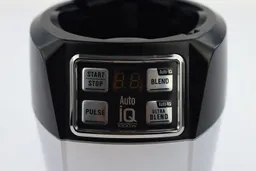 A close-up of the control panel of the Ninja BL480D Nutri which features the Start/Stop, Pulse, Auto-IQ Blend, and Auto-IQ Ultra Blend button. 