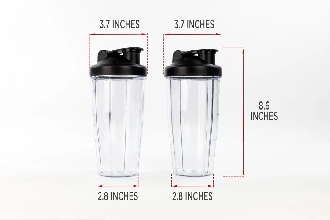 Two blending cups of the iCucina personal blender standing on a table, with the width of their top and bottom being noted to the side as 2.8 inches, and the total length of the unit as 8.6 inches.