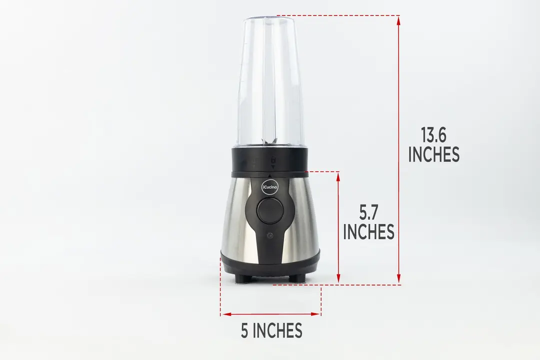 The iCucina personal blender standing on a gray table, with the length of its motor base being noted to the side as 5.7 inches, and the total length and width of the unit as 13.6 inches and 5.0 inches, respectively.