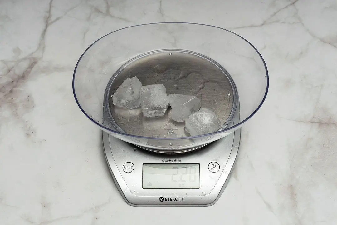 The amount of unblended ice cubes (2.2 oz) of the Vitamix 5200 blender displayed on a scale’s screen.