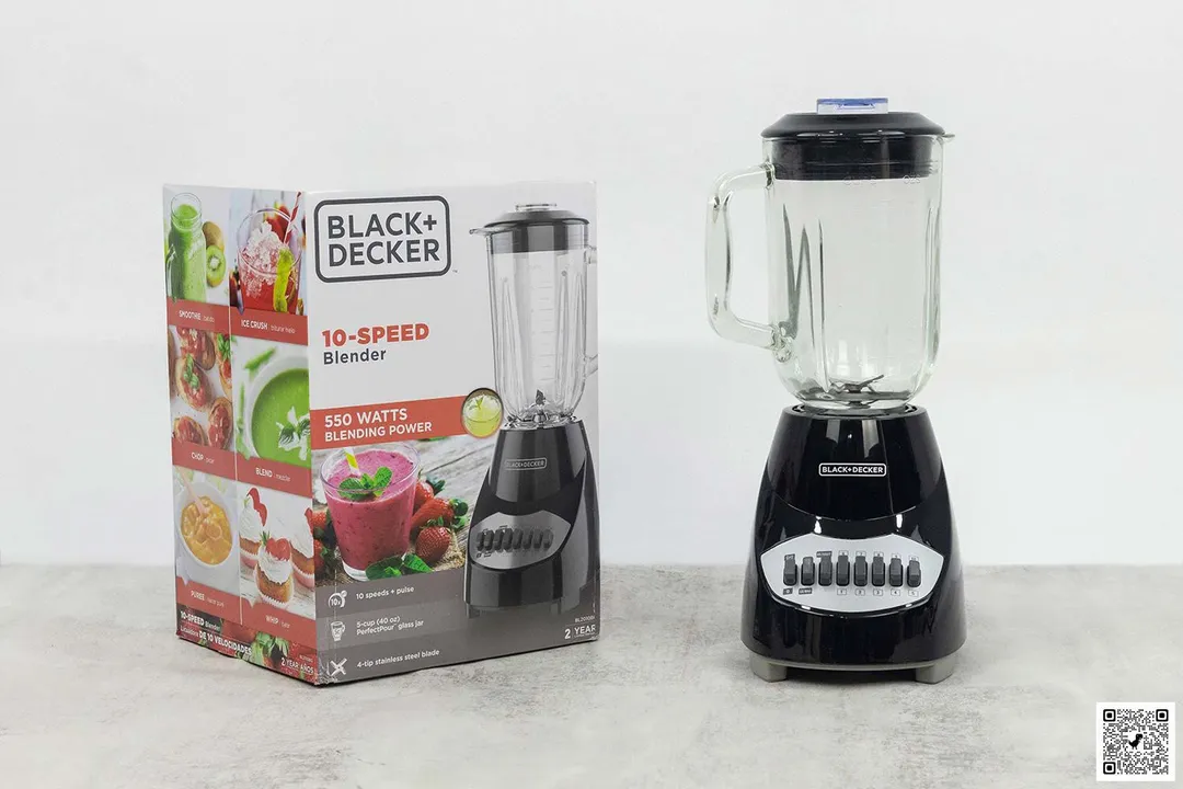 The Black+Decker stands blender on a table, with a carton box by its sides.