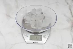 The scale's screen shows 8.17 oz of uncrushed ice cubes remaining from the  Cuisinart SPB-7CH SmartPower blender.