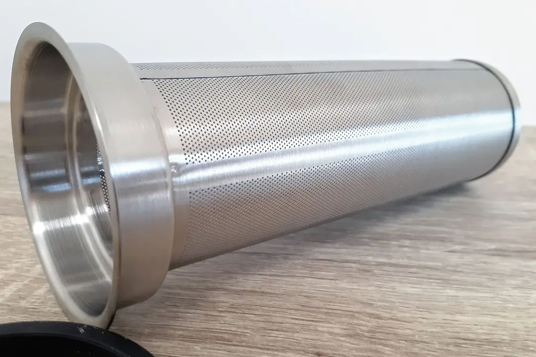 A typical stainless steel immersion filter used in a cold brew coffee maker or tea infuser.