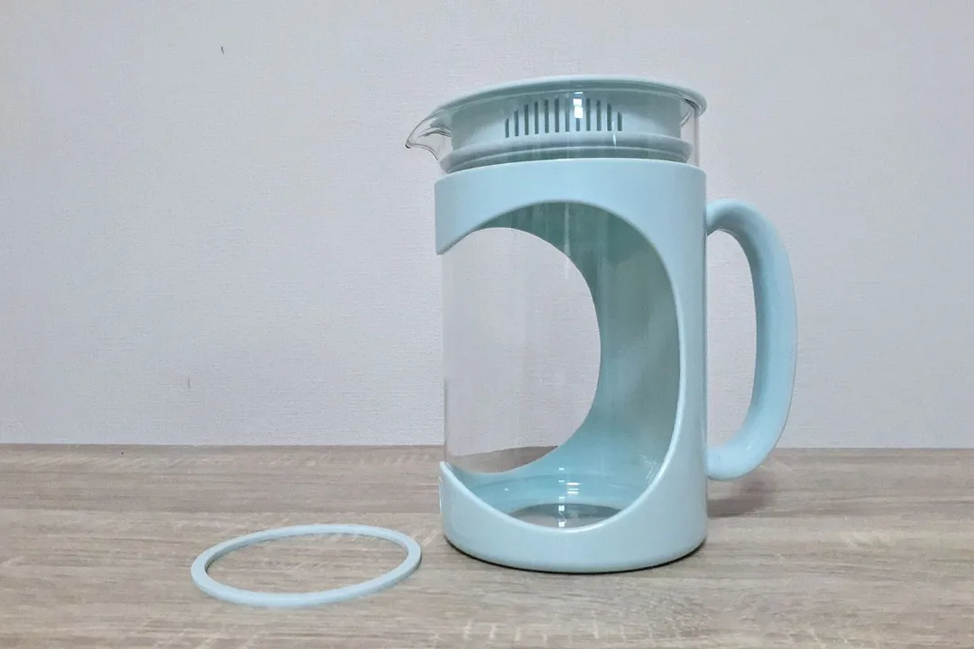 The Primula Burke Deluxe cold brew coffee maker together with a silicone seal removed from its base.
