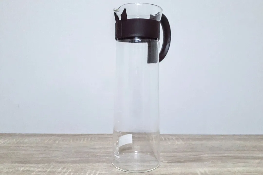 A full view of the tall glass Hario Mizudashi cold brew coffee carafe.