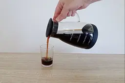 A short video showing cold-brewed coffee being poured from the Bean Envy glass carafe.