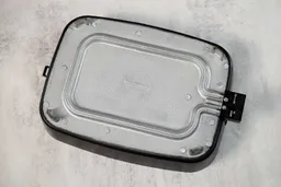 The bottom of the detached pan of the Presto Foldaway Non-Stick Electric Skillet 06857.