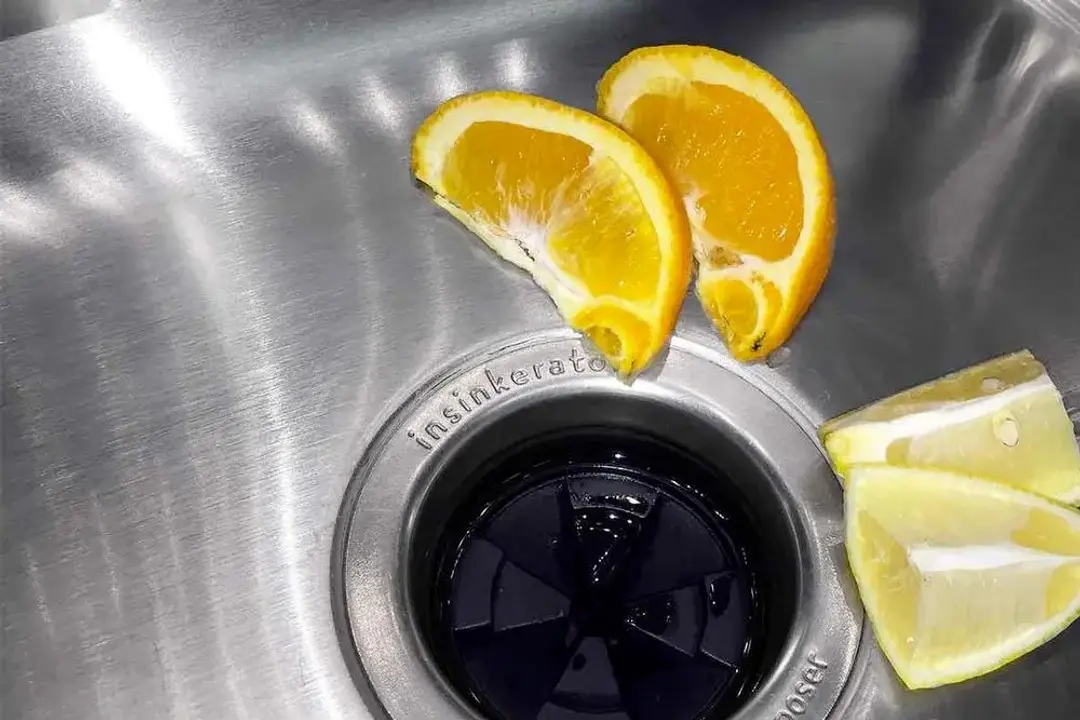 Clean garbage disposal with lemon