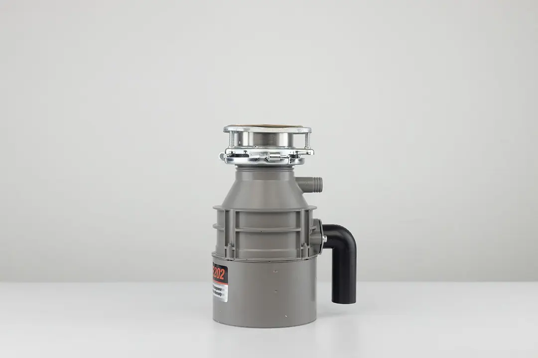Evergrind E202 1/2 HP Garbage Disposal, with 3-Bolt Mount assembly on top and outlet/discharge set in place.