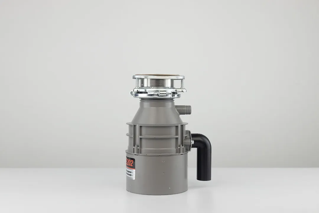 Evergrind E202 1/2 HP Garbage Disposal, with 3-Bolt Mount assembly on top and outlet/discharge set in place.