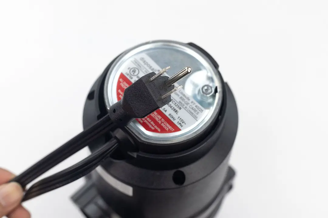 Bottom view of GE GFC525N 1/2 HP Garbage Disposal corded garbage disposal with type-B power cord.