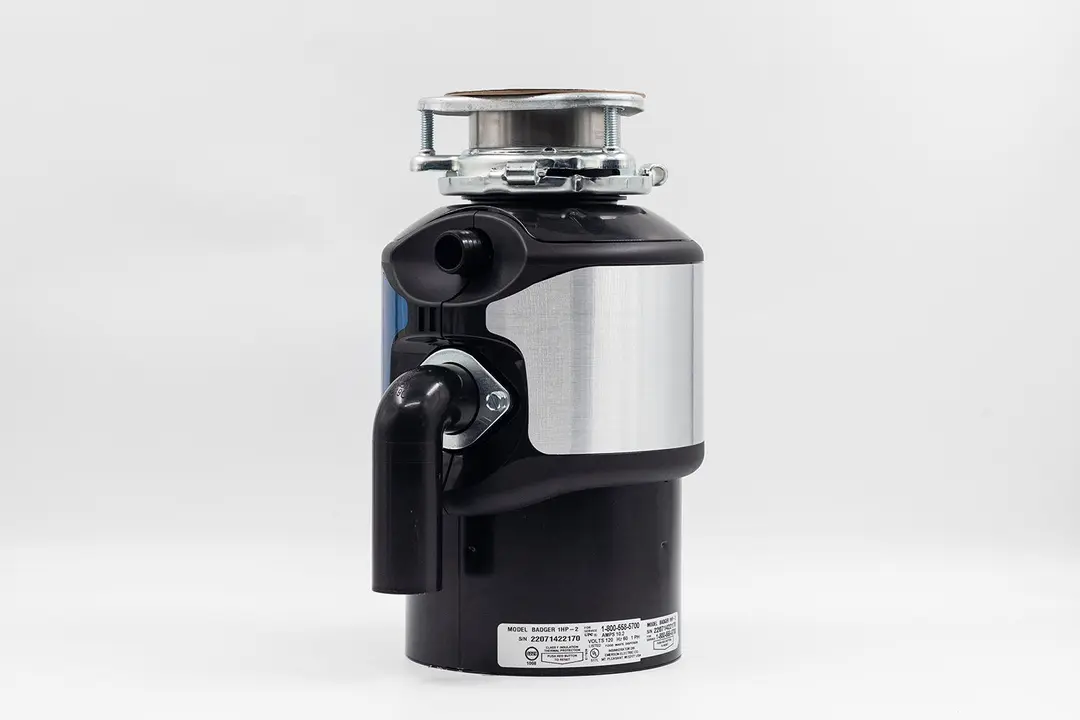InSinkErator Badger 1HP Garbage Disposal, with 3-Bolt Mount assembly on top and outlet/discharge set in place.
