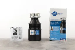 InSinkErator Badger 5XP 3/4 HP Continuous Feed Garbage Disposal, 3-Bolt Mount assembly on top, its box, and user manual.