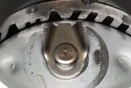 Grinding components in InSinkErator Badger 5XP showing design of flywheel and impeller(s).