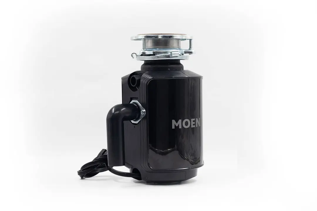 Moen Host Series 3/4-HP Garbage Disposal, with 3-Bolt Mount assembly on top and outlet/discharge set in place.