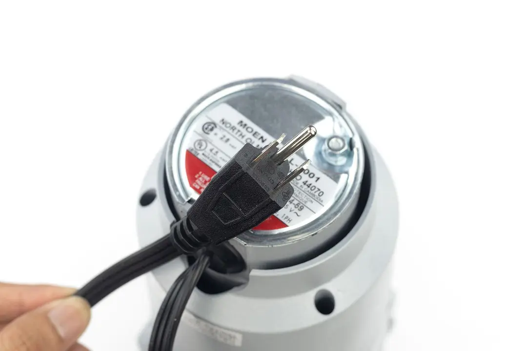 Bottom view of Waste King L1001 1/2 HP Garbage Disposal corded garbage disposal with type-B power cord.