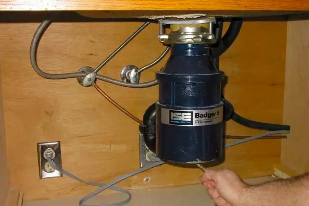 The power switch of a garbage disposal unit