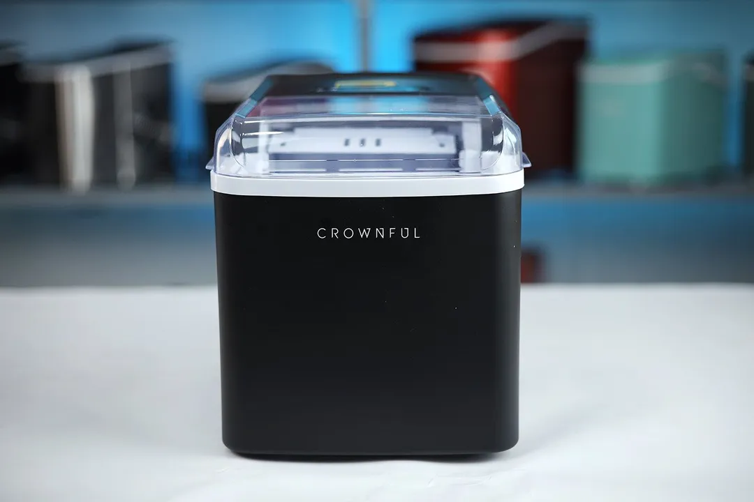 The Crownful countertop ice making standing on a table.