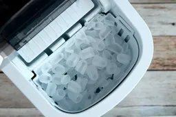 Degraded ice shown in an ice basket of a portable ice maker after being left to run overnight for 8 hours.