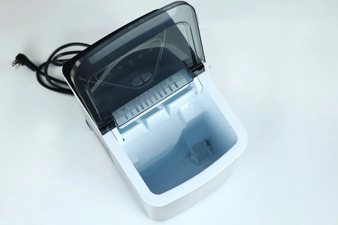 Top down view of the Silonn countertop ice maker showing an empty water reservoir.