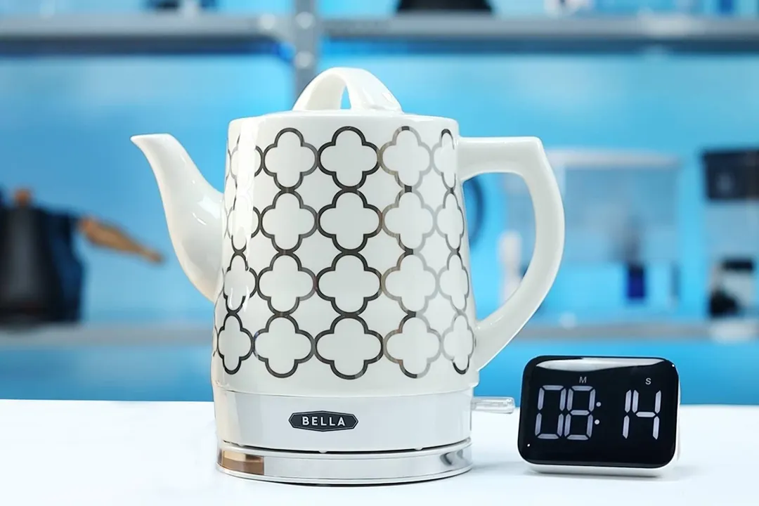1.5 liter of water boiling inside the Bella Ceramic Gooseneck Electric Kettle (14745). The digital timer displays 8 minutes and 14 seconds.