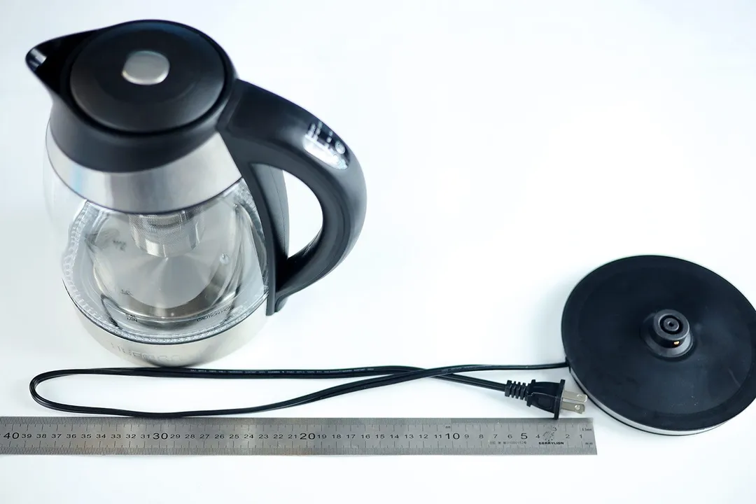 The two-pronged flat power cord of the Chefman Electric Kettle with 5 Presets (RJ11-17-CTI-RL) is 29.72 inches long (75.5 cm).