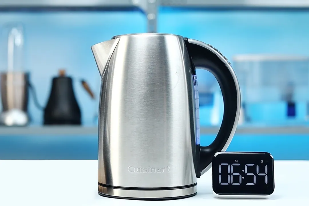 1.5 liter of water boiling inside the Cuisinart Stainless Steel Electric Kettle with 6 Preset Temperatures (CPK-17P1 PerfecTemp). The digital timer displays 6 minutes and 54 seconds.