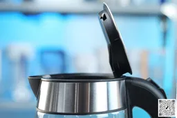 The pop-up lid of the Elite Gourmet Electric Glass Kettle (EKT-602) opens at an 80° angle.