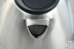 The mesh filter attached to the plastic black V-shaped spout of the Elite Gourmet Electric Glass Kettle (EKT-602)