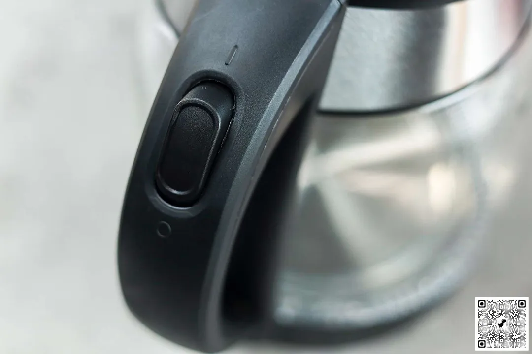 The power switch located on the handle of the Mueller Ultra Electric Kettle (M99S).
