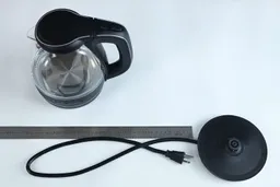 The three-pronged round power cord of the Ovente Electric Glass Kettle (KG83B) is 29.53 inches long (75 cm).