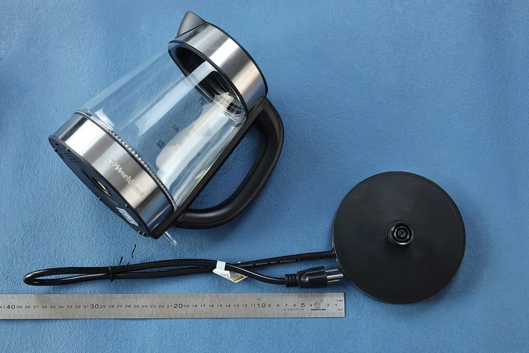 The three-pronged round power cord of the Peach Street Electric Kettle PE-1300 is 29.92 inches long (76 cm).