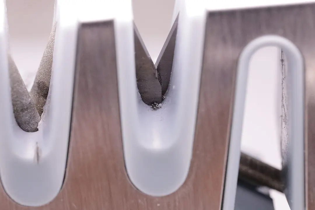 Metal residue on the abrasive slots on the Wamery knife sharpener