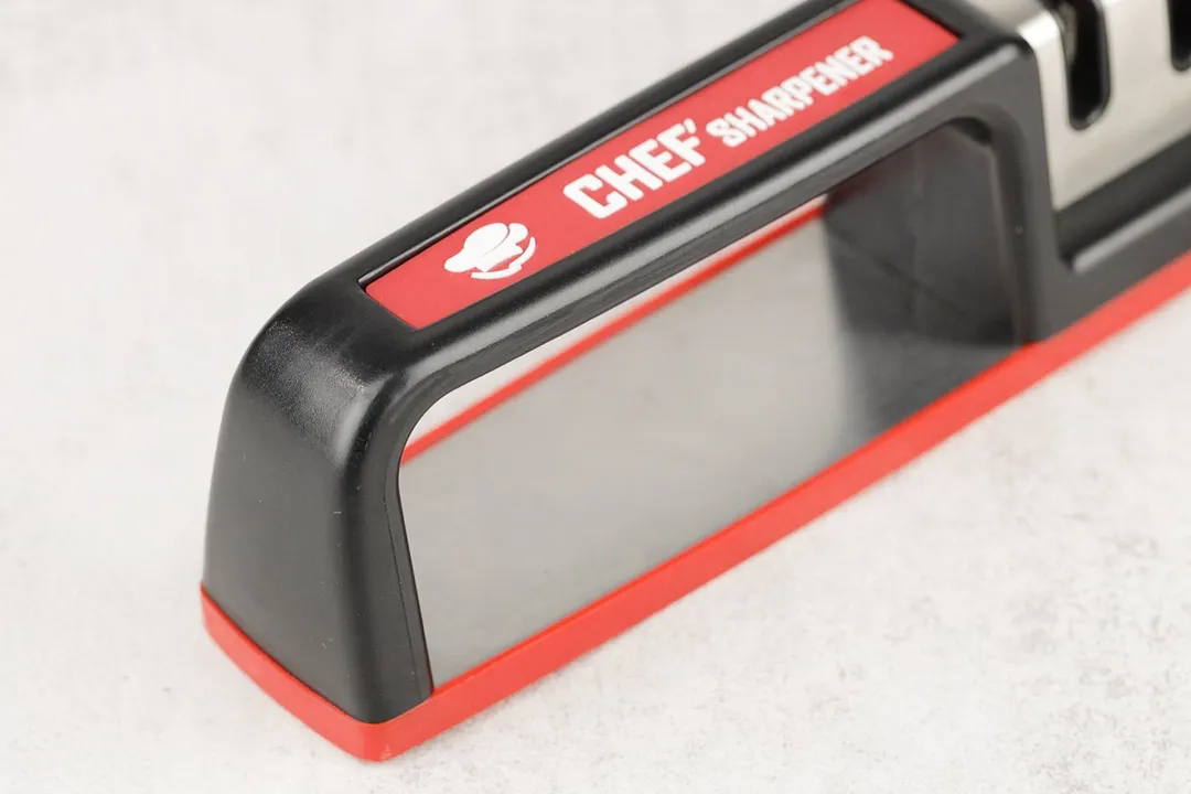 The grip of the Cubikook kitchen knife sharpener