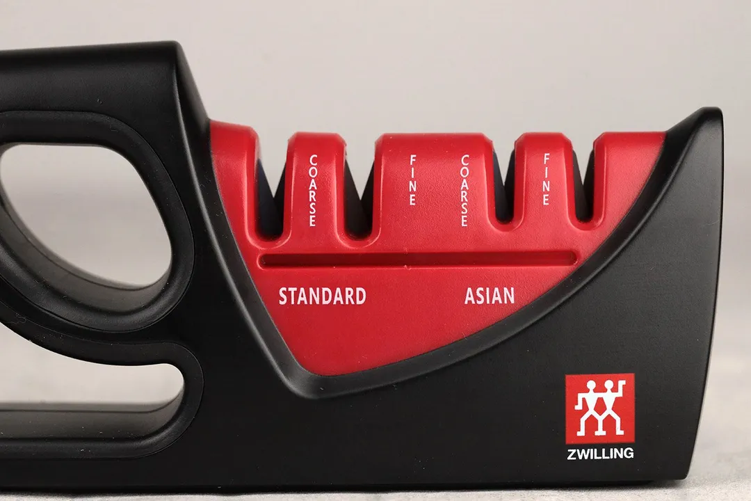 The working section on the Zwilling sharpener, with 4 slots featuring Coarse and Fine gits for standard and Asian knives