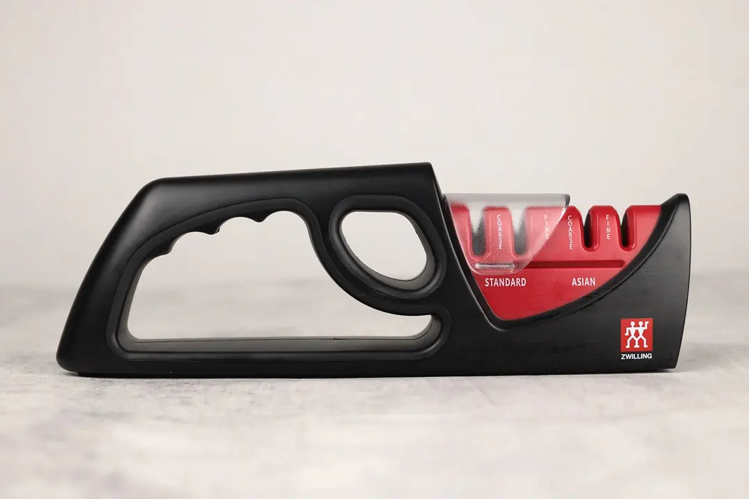 The Zwilling Henckels 4-stage knife sharpener standing on a surface