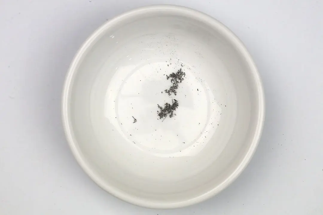 Metal sharpening residue in a bowl