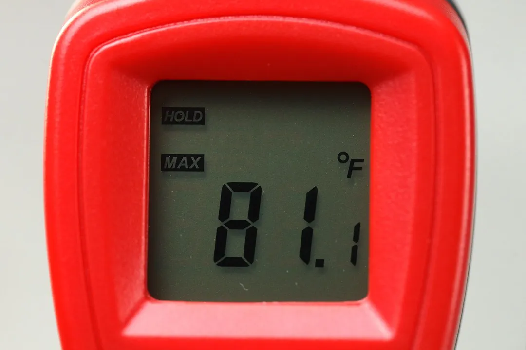 The backlit LCD screen of the Eventek ET312. The screen shows 81.1°F. The symbologies for HOLD and MAX are lit up.