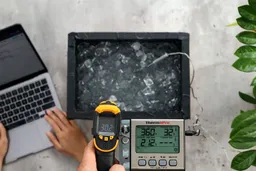 The Sovarcate HS960D measuring the temperature of an ice chest from 12 inches away. The screen reads 30.2°F.