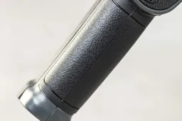 The backside of the textured grip of the Sovarcate HS980E IR thermometer.