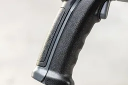 The textured grip of the Sovarcate HS980E IR thermometer from the side.