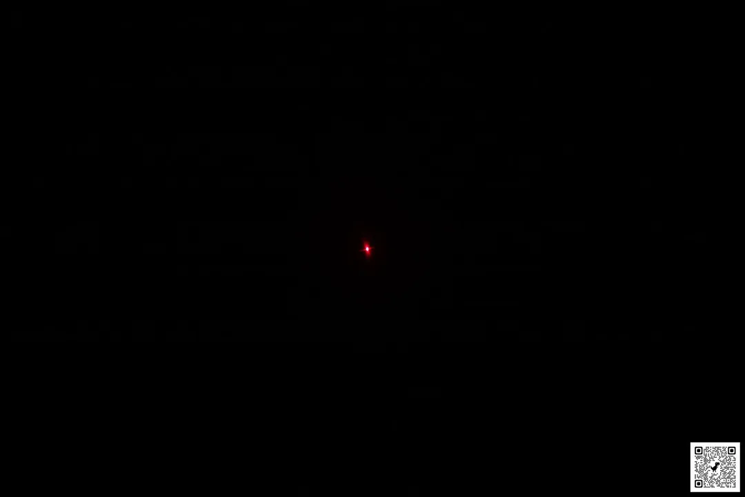 The single-dot, red laser produced by the laser emitter of the ThermoPro TP-30 IR thermometer.