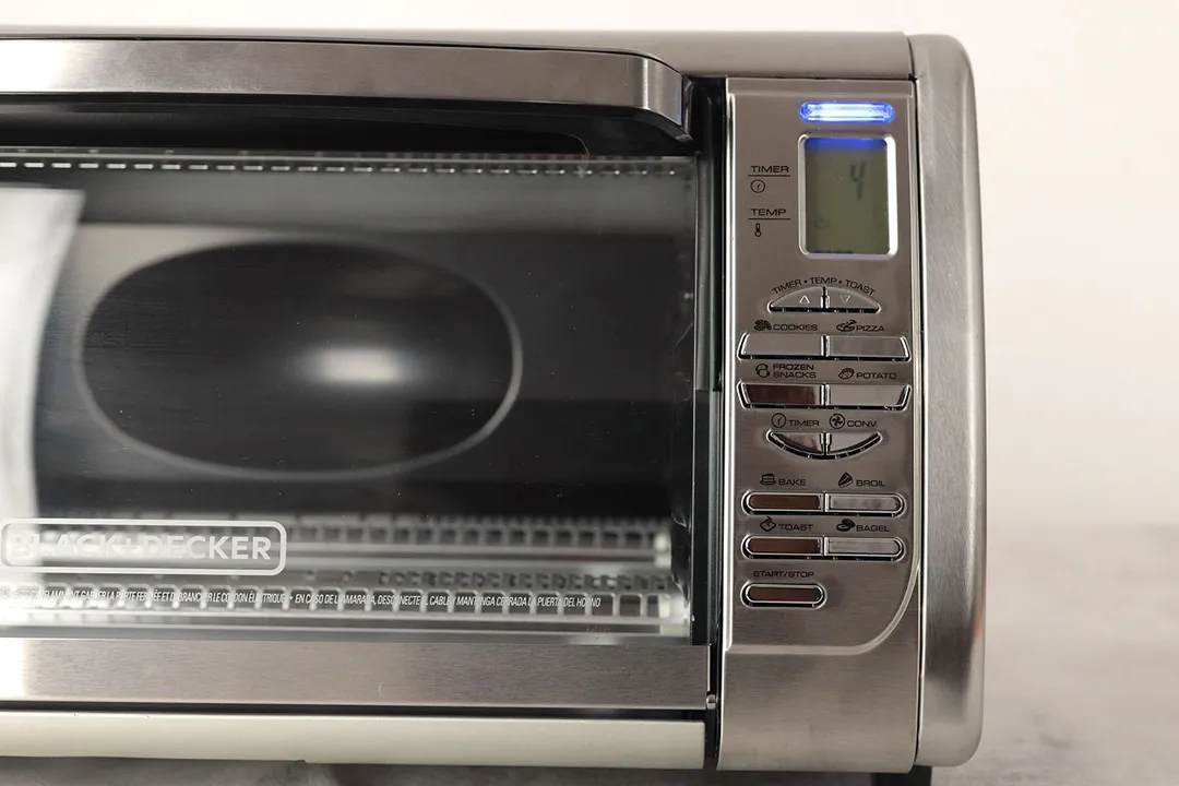 The BLACK+DECKER CTO6335S Toaster Oven’s control panel has an LCD and 13 buttons for 8 cooking functions and 5 features.