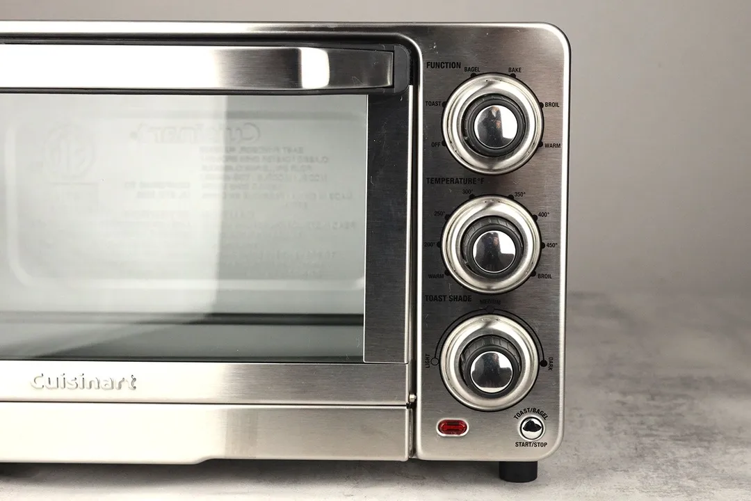 The Cuisinart TOB-40N’s control panel has 1 start/stop button and 3 control dials for function, temperature, and toast shade.