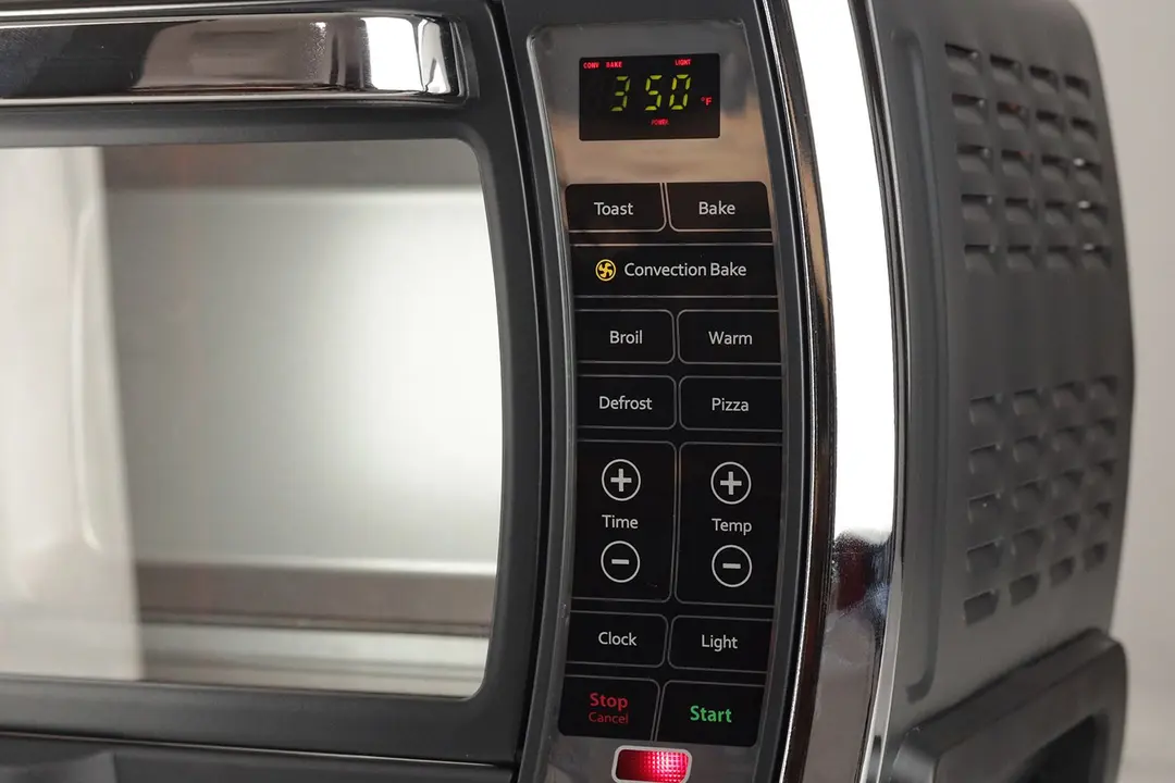 The Oster TSSTTVMNDG-SHP-2 Convection Toaster Oven has an LCD and 15 flat buttons for 7 cooking functions and 8 features.